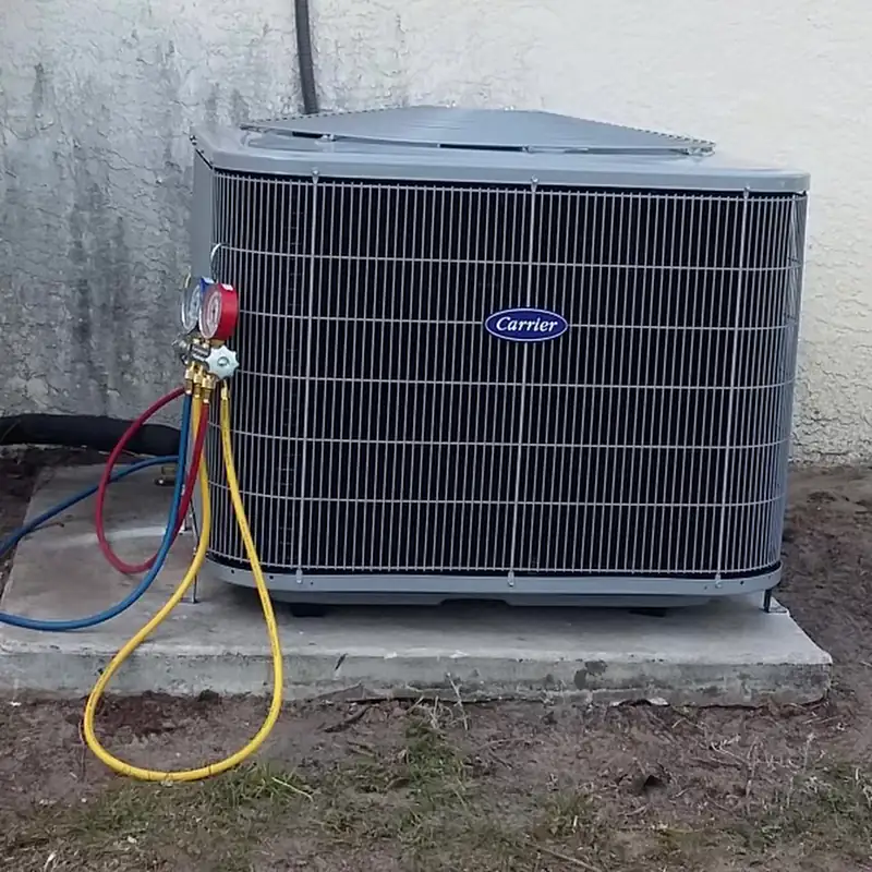 Carrier condenser with manifold gauge hoses connected for testing