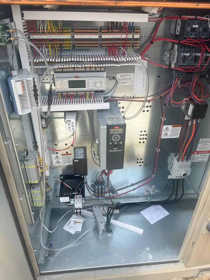 Commercial refrigeration control panel opened for service
