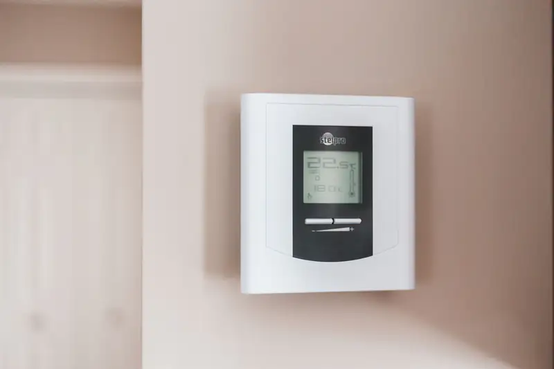 Wall thermostat in a home